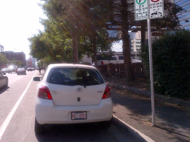 anotehr car parked in teh bike lane